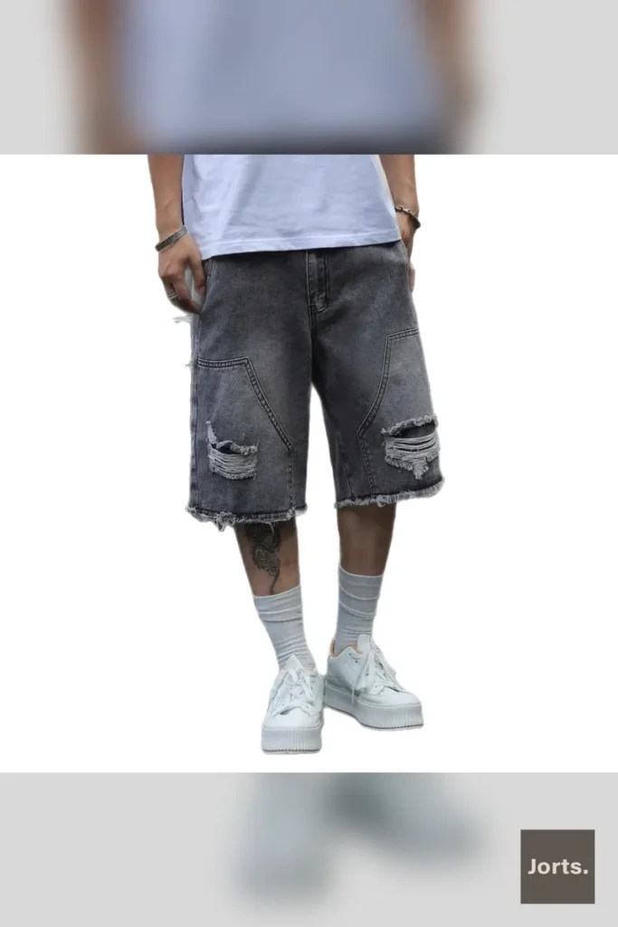 Front view of men's gray straight-leg cropped denim shorts with slight stretch, styled for a casual Y2K look.