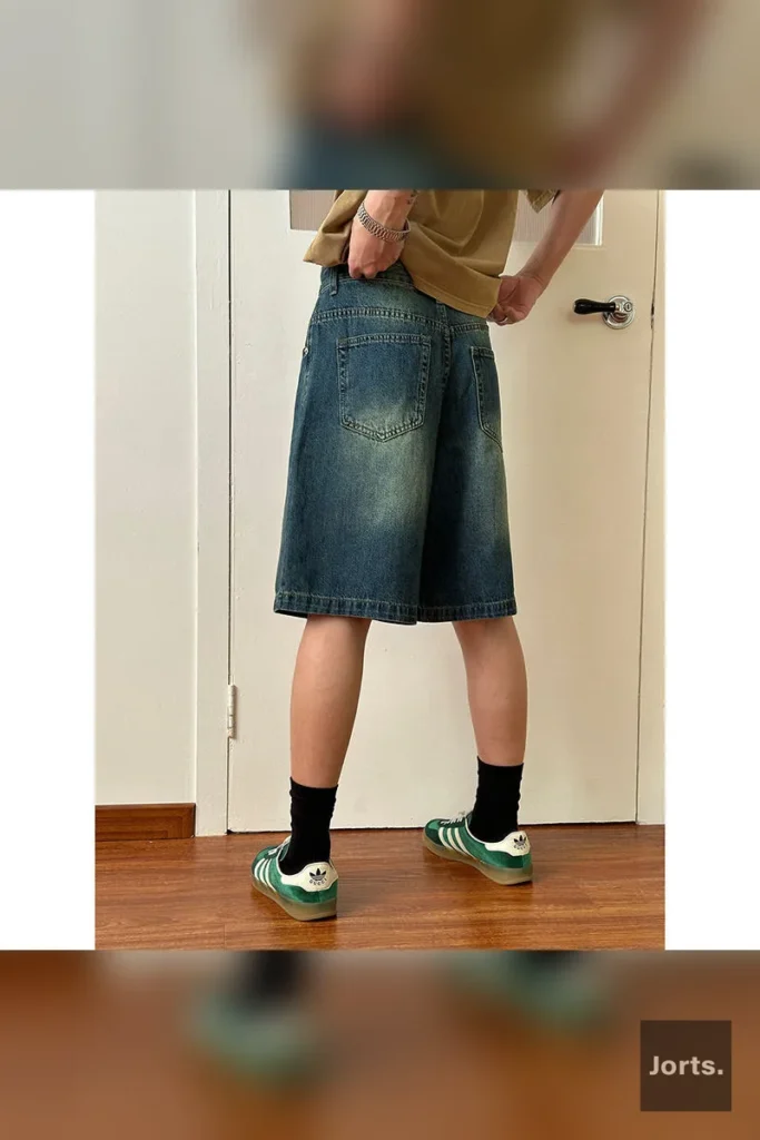 Front view of men's gray retro washed loose fit denim jorts, showcasing the relaxed Y2K style.