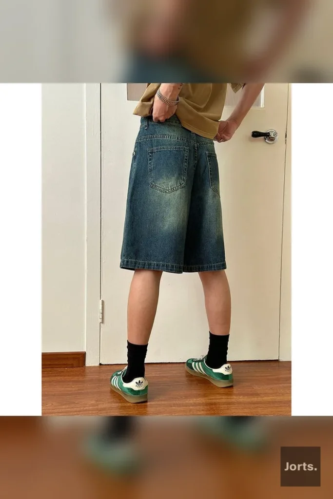 Men's retro blue loose fit denim jorts styled for an urban Y2K aesthetic.