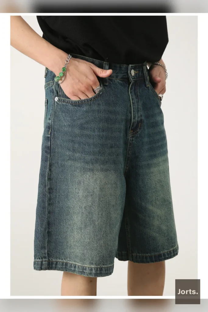 Model posing in black vintage loose fit pants, demonstrating the comfortable and versatile style.